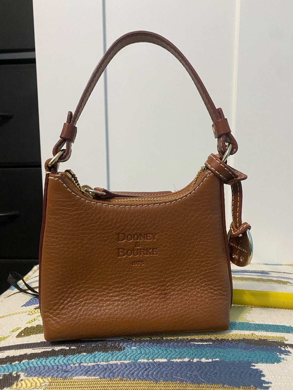 Dooney & Bourke Bitsy Brown Leather Mini Handbag